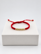 Pulsera con seis balines diamantados N.º 5 en color rojo